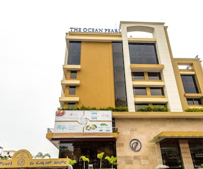 https://imgcld.yatra.com/ytimages/image/upload/t_hotel_yatra_city_desktop/v1419402605/Domestic Hotels/Hotels_Mangalore/The Ocean Pearl/Hotel_Exterior.jpg